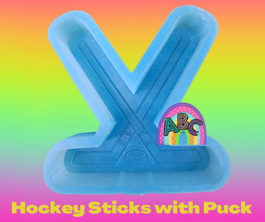 Hockey Sticks with puck